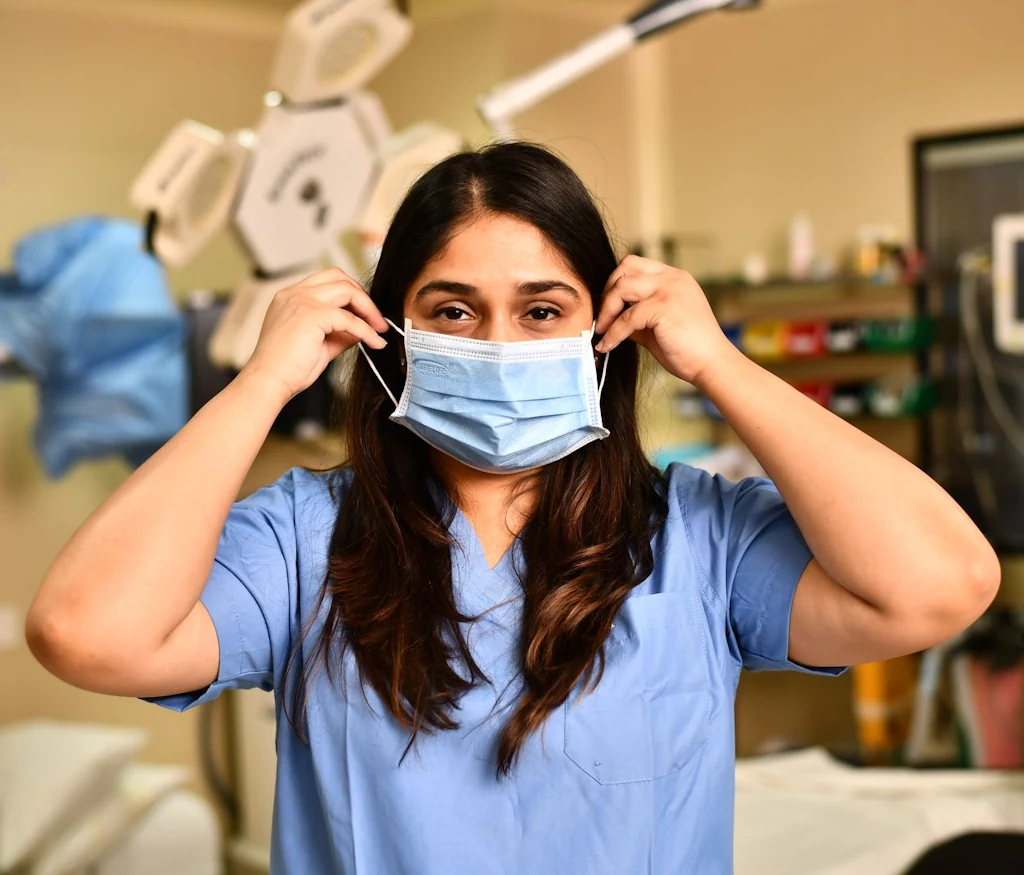 Doctor performing advanced treatment for loose vagina in clinic